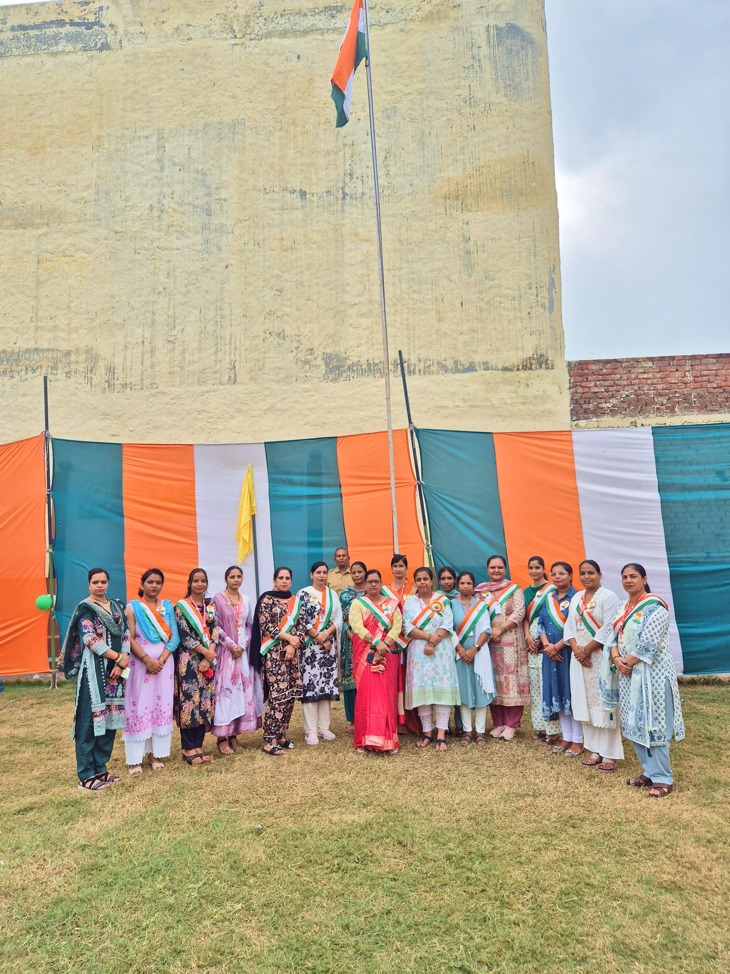Teachers at the Independence Day flag hoisting, Uttam Public School